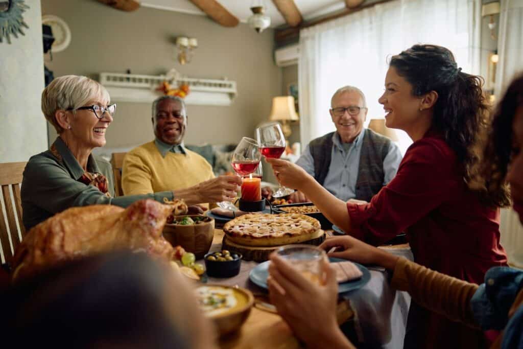 Paradigm Senior Living | Seniors and family having dinner