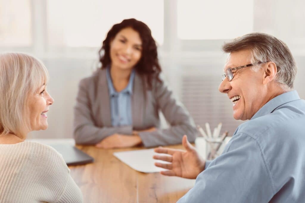 Paradigm Senior Living | Senior couple in a sales meeting